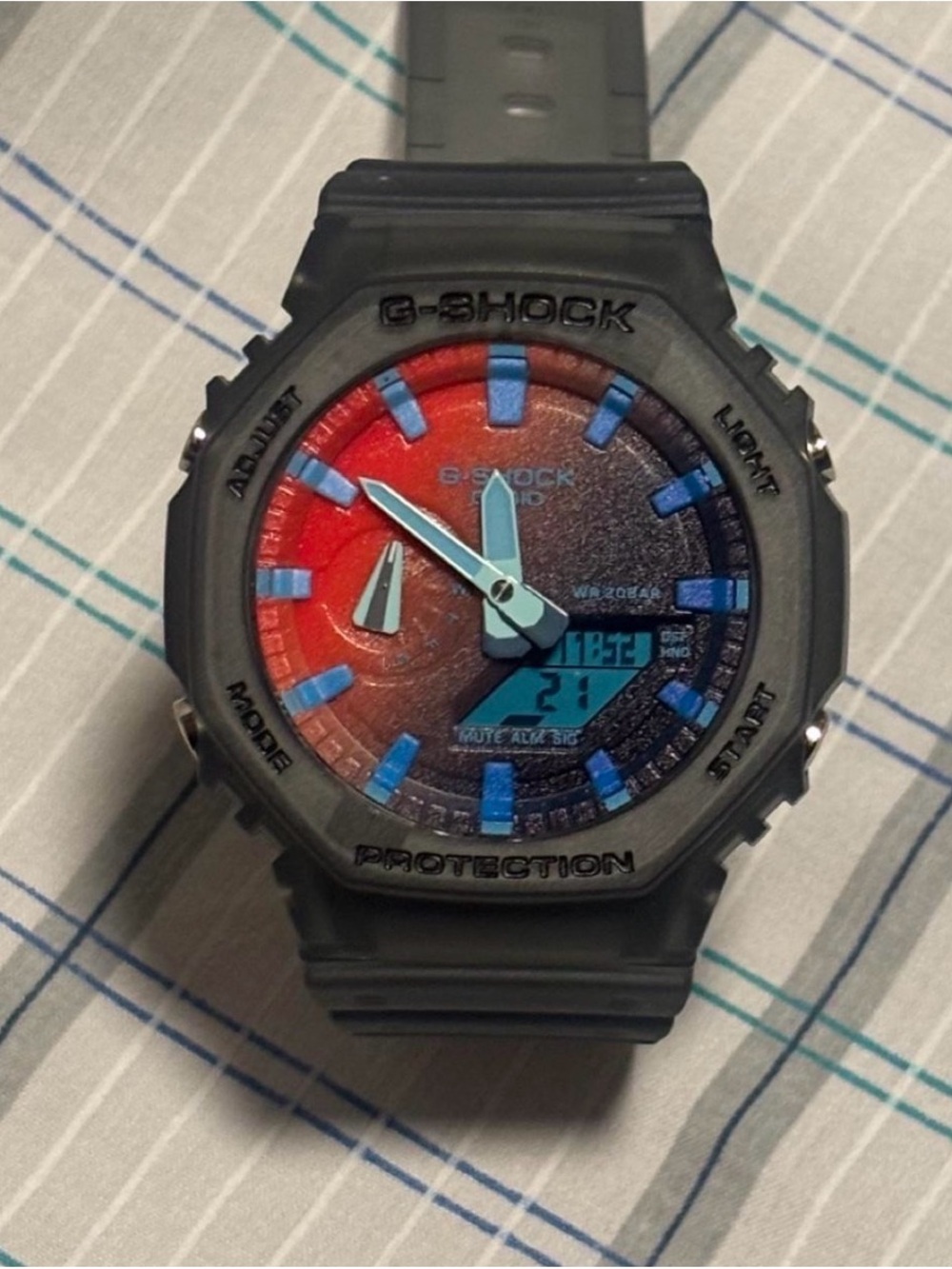 G-Shock Black Watch with Red-to-Blue Gradient Dial